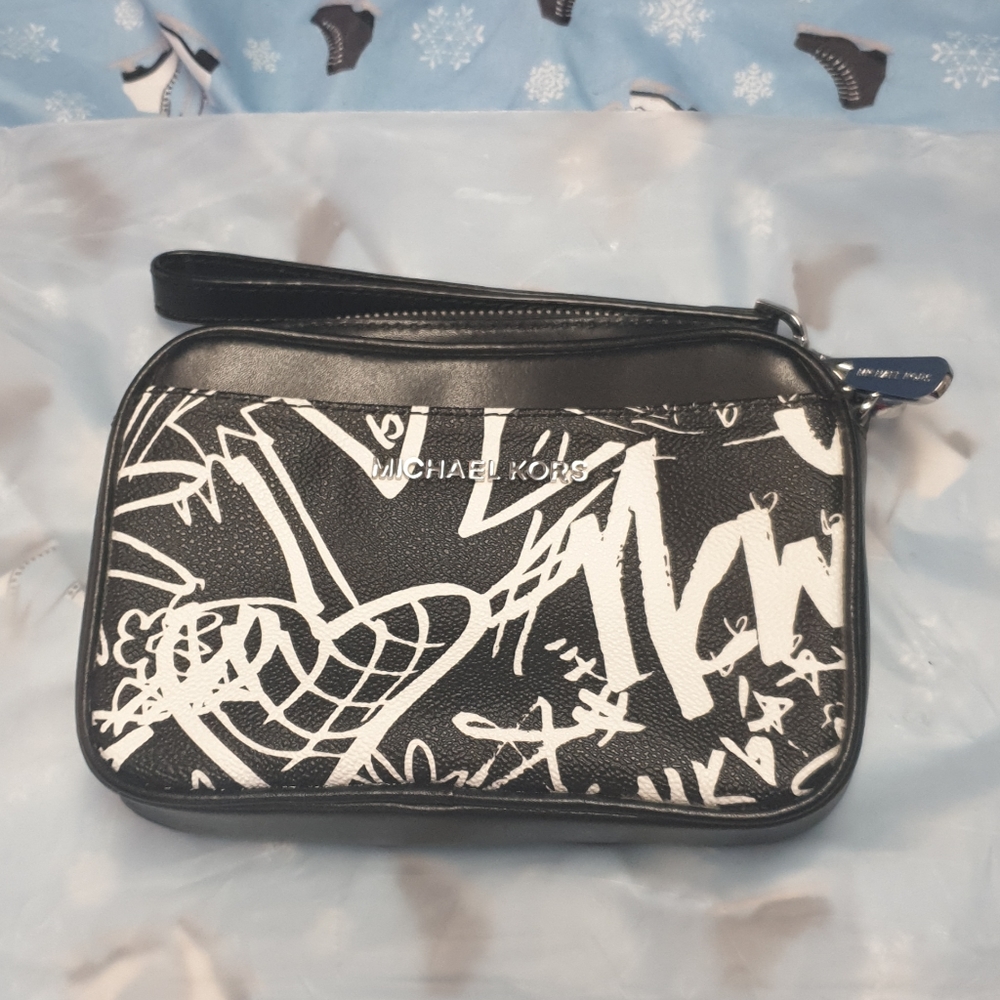 Michael wristlet with belt loops.